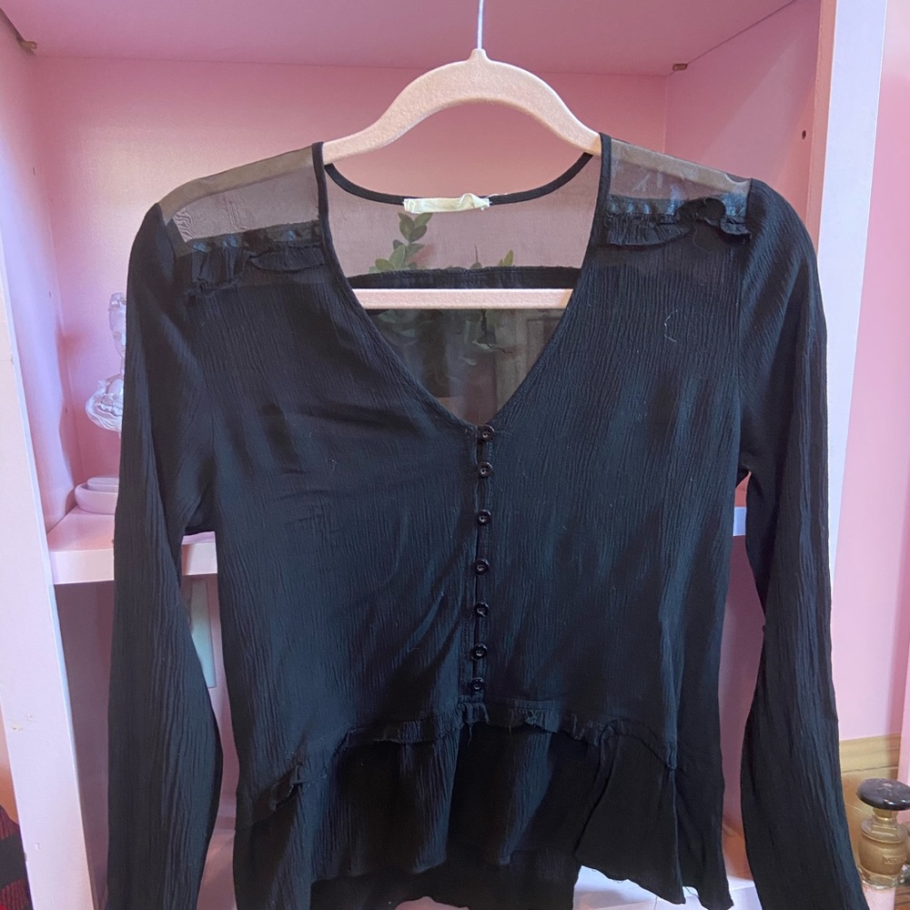 Black flowy bottom shirt